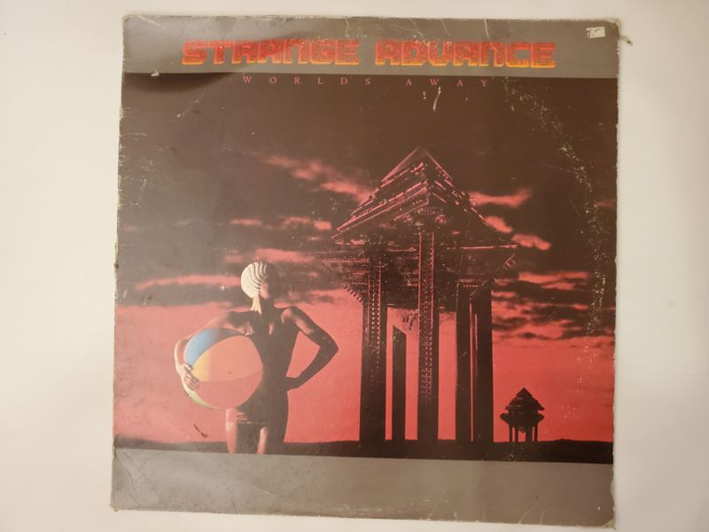 Strange Advance Worlds Away vinyl record